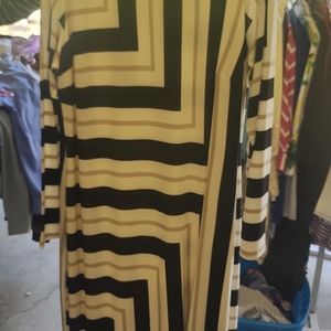 Dress, 18/20 womans but fits a little smaller.